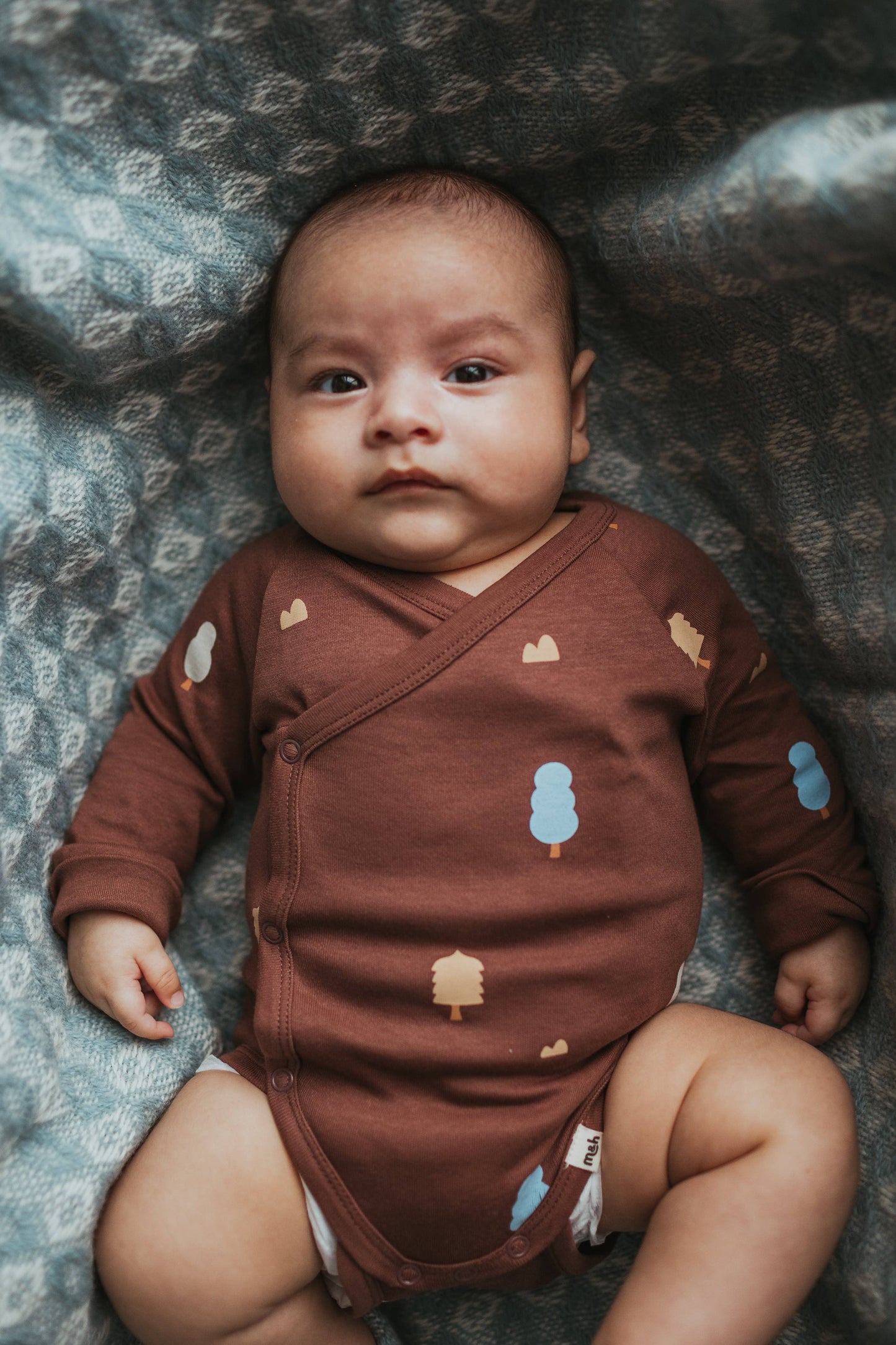 Organic Cotton Wrap Over Long Sleeve Bodysuit in Raisin